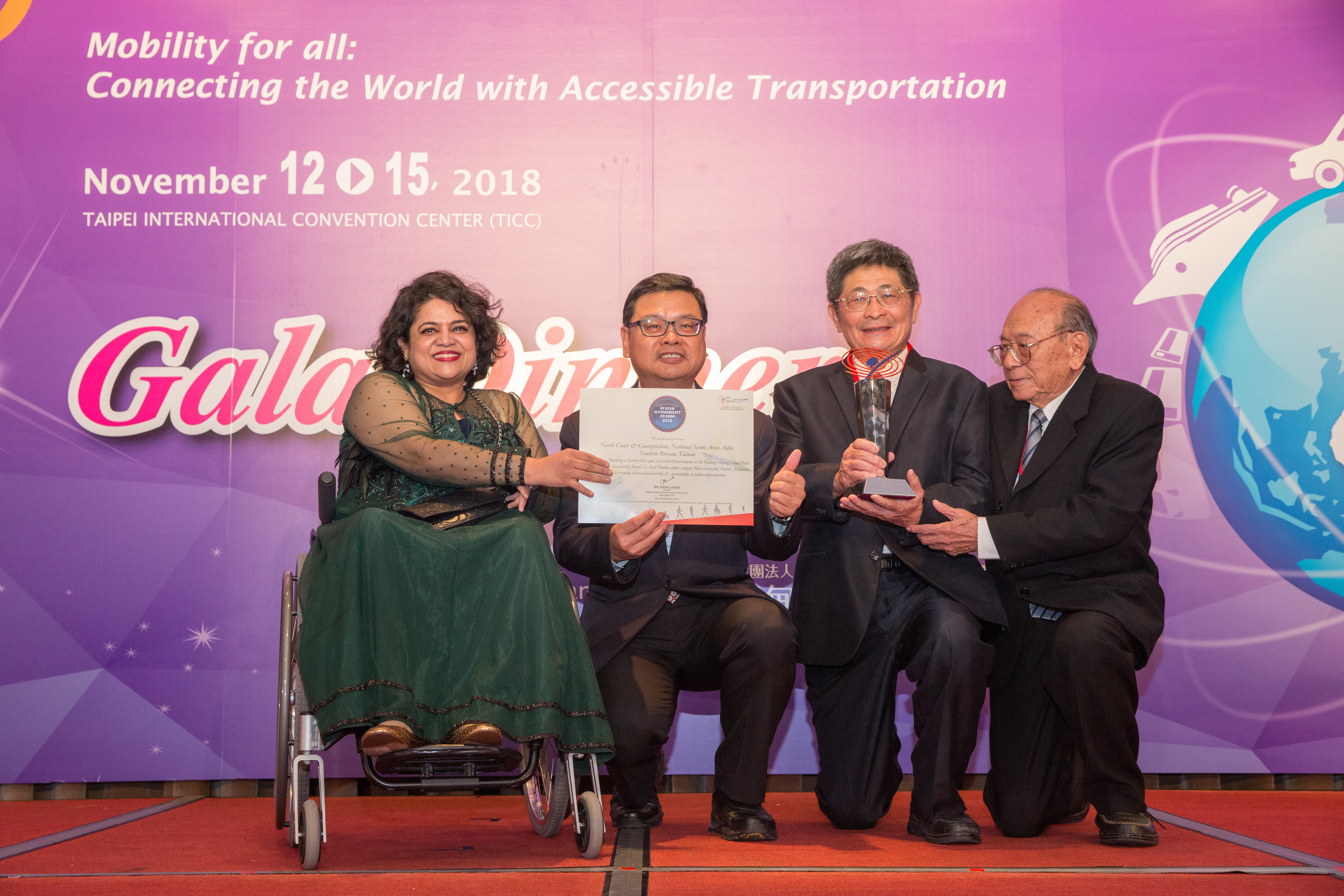 Photo of Mr. Shi-Ching, Chang, Dy Director General, Tourism Bureau MOTC Taiwan and Mr. Jenn-Chyan Chang, Director of North Coast & Guanyinshan National Scenic Area Administration, Tourism Bureau, MOTC, Taiwan, receiving Svayam Accessibility Award 2018 from Svayam Founder Ms.Sminu Jindal & Mr. Patrick Yey, Hony. Chairman, TRANSED2018, at Taipei on 14 Nov 2018 on the sidelines of 15th International Conference on Mobility and Transport for Elderly and Disabled Persons (TRANSED2018)